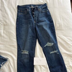 Distressed Blue Jeans